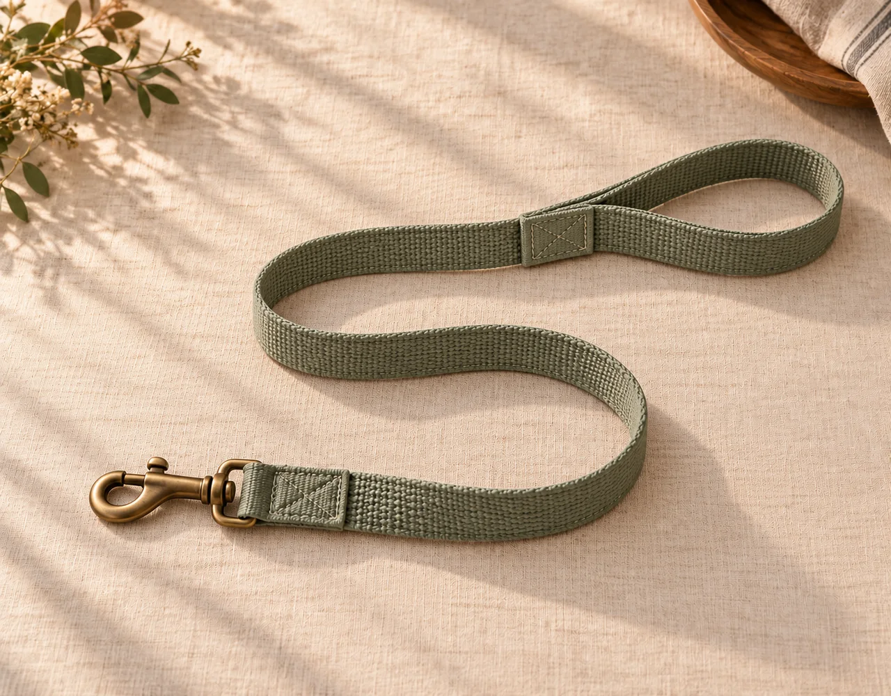 Pet leads & leashes in a warm neutral editorial setting