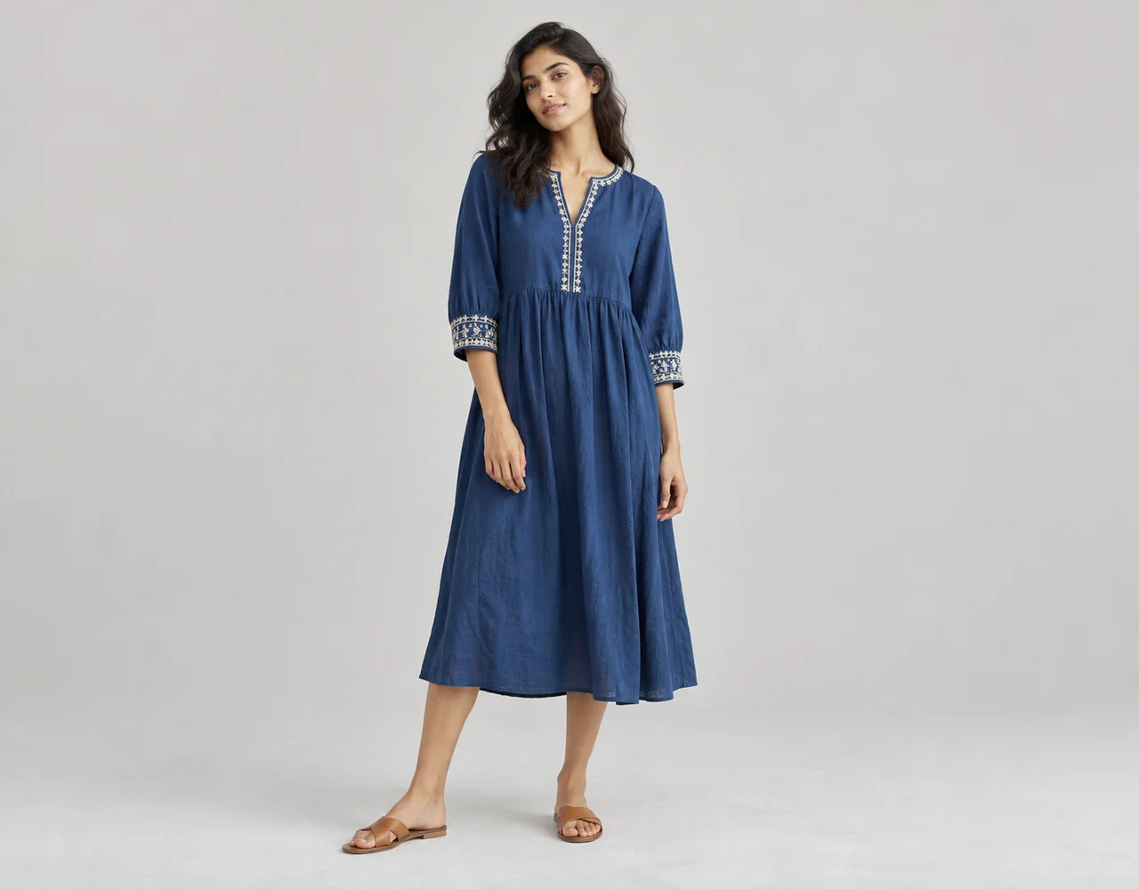Indigo cotton midi dress with embroidered neckline and cuffs